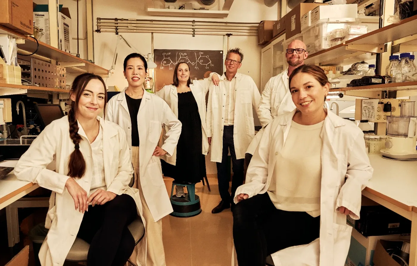 The SiPore Technologies team together in the laboratory